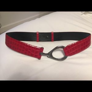 Red patent belt.